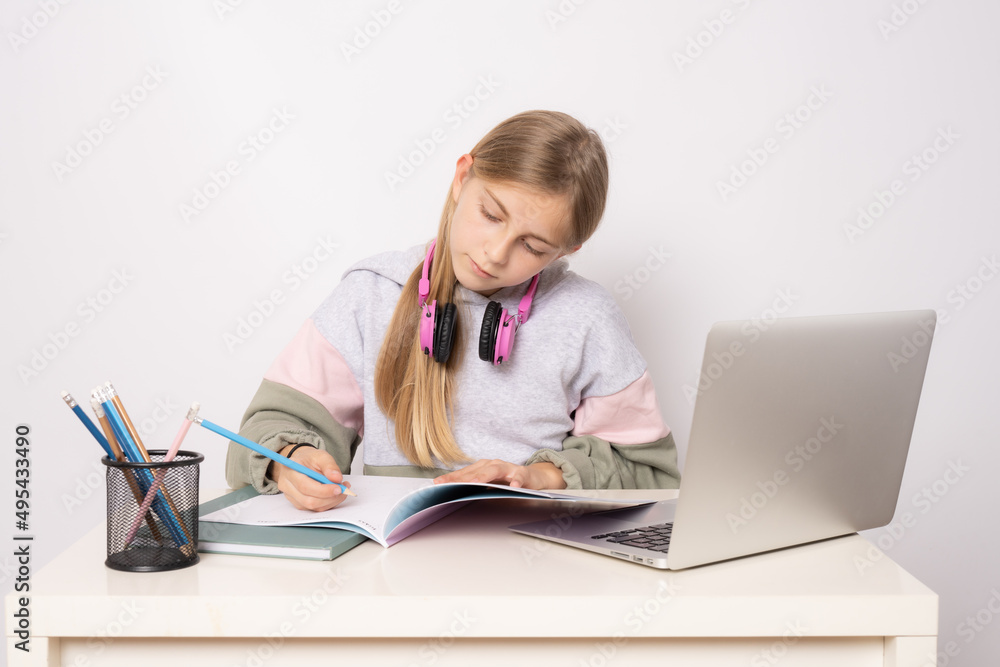 Student preparing for the exams isolated over white background. Education concept. Student preparing for the exams isolated over white background. Education concept.