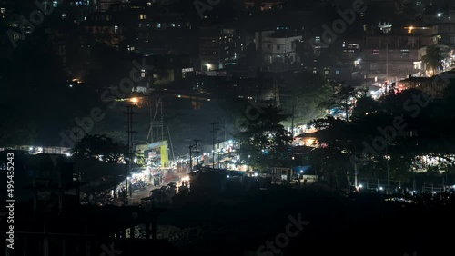 This timelapse captures the cityscape of the busy capital of Assam, Guwahati at night with the busy traffic of the city including traffic trails. photo
