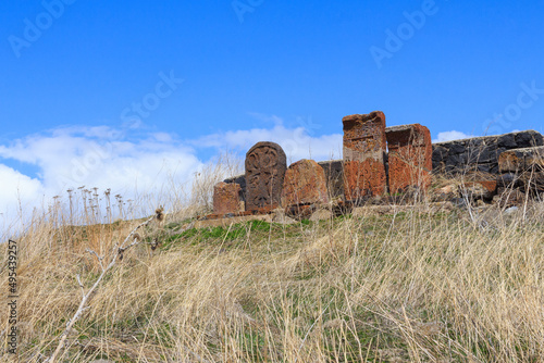 Armenian stone cross called khachkar on the territory of the ancient monastery of Sevanavark in Armenia 