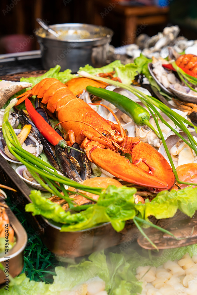 Shellfish plate of crustacean seafood with fresh lobster as an ocean gourmet dinner Shellfish plate of crustacean seafood with fresh lobster as an ocean gourmet dinner