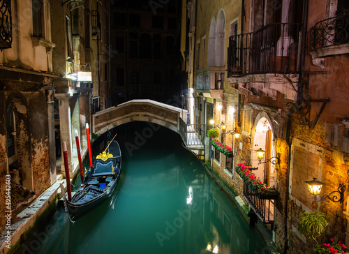 A romantic night scene in the backstreets of Venice, Italy