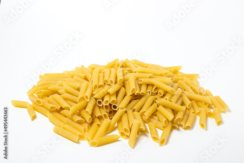 Dry pasta on a white background. Large pasta. Traditional food