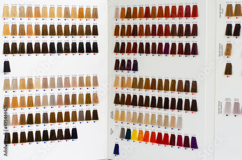 Various hair dye sample chart. Hair coloristic concept. photo