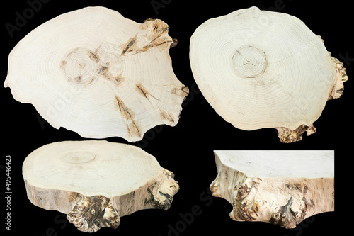 Pieces of wood isolated on black background. Texture of a polished cut of a tree close-up. Side view. Woodworking, carpentry production.