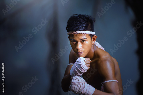 Topless man in fighting position photo