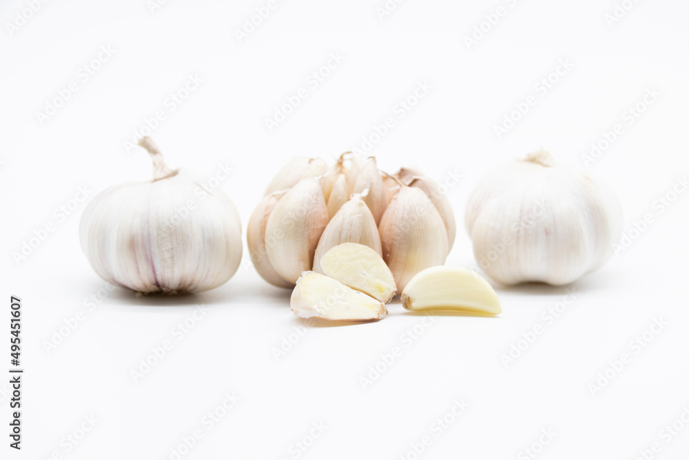 garlic slices isolated on white background.
