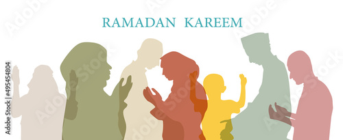 Silhouette of muslim men and woman praying,  ramadan kareem