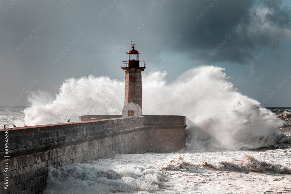 felgueiras lighthouse in porto with ocean waves