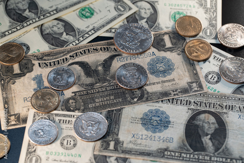 Antique US Dollar banknotes. Half Dollar and Eisenhower Dollar coins