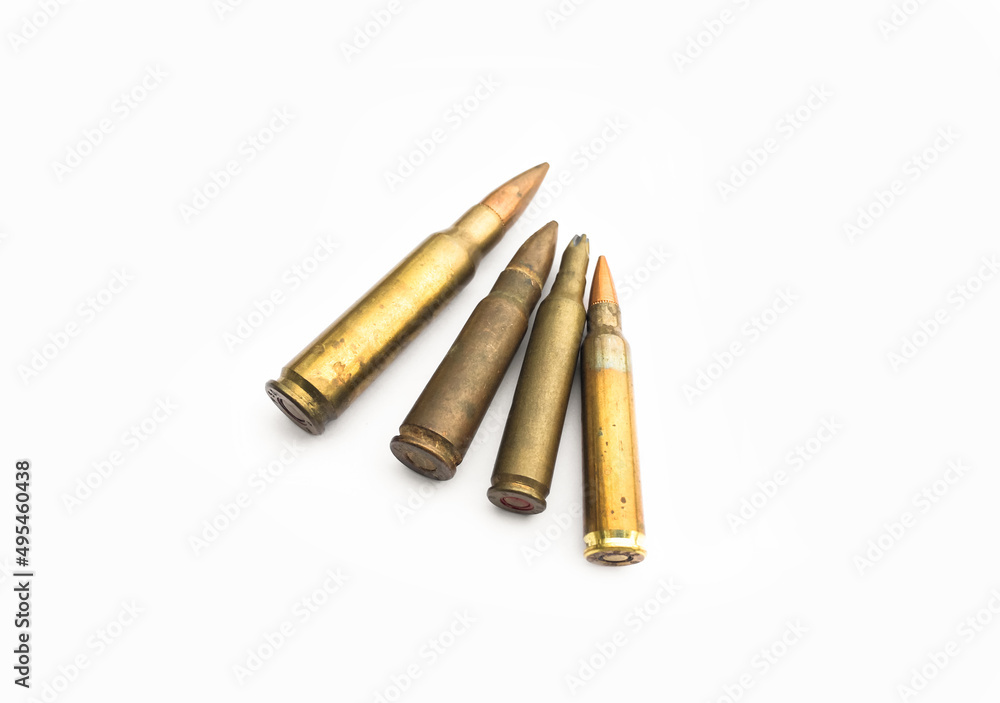 isolated old ak and m16 bullets on white background, soft and selective focus. isolated old ak and m16 bullets on white background, soft and selective focus.