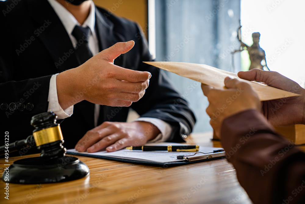 lawyer or attorney who is taking bribes reads the statute of