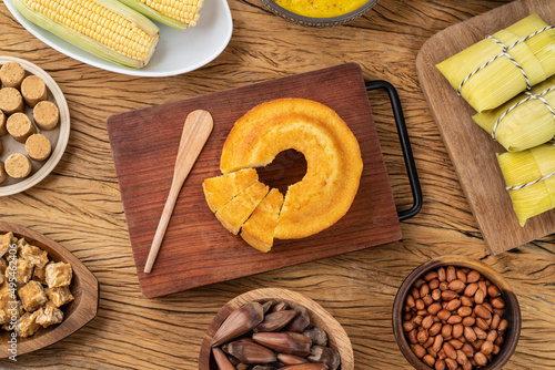 Typical brazilian june festival food over wooden table. Festa junina photo