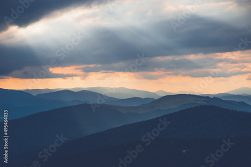 the light in the mountains breaks through the clouds Ukraine Carpathians © Aleksandr