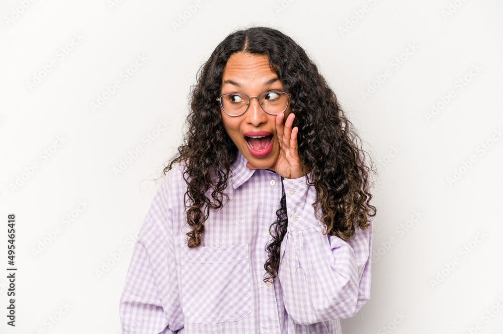 Young hispanic woman isolated on white background shouting excited to front. Young hispanic woman isolated on white background shouting excited to front.