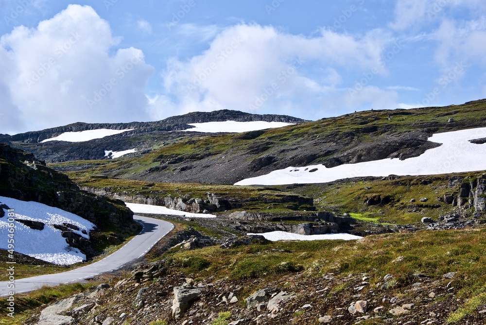 Highland plateau with glacier and the narrow and winding tourist road Aurlandsvegen in Sogn og Fjordane fylke in Norway. Highland plateau with glacier and the narrow and winding tourist road Aurlandsvegen in Sogn og Fjordane fylke in Norway.