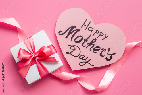 Women mothers day concept with pink ribbon fift box photo