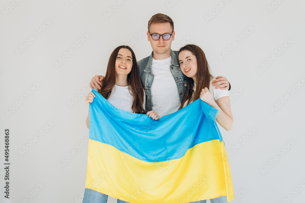 Friends with flag of Ukraine. Stop war in Ukraine