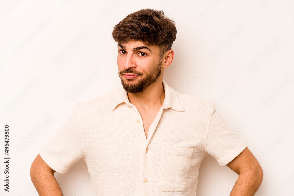 Obraz premium Young hispanic man isolated on white background unhappy looking in camera with sarcastic expression.