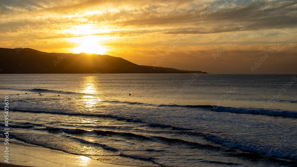 Obraz premium sunset on the sunset Canteras beach in Las Palmas city