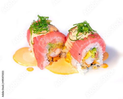Sushi roll pieces of bluefin tuna, avocado, shrimp. traditional Japanese cuisine,