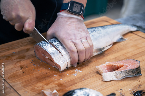 Chef preparing a salmon fis...