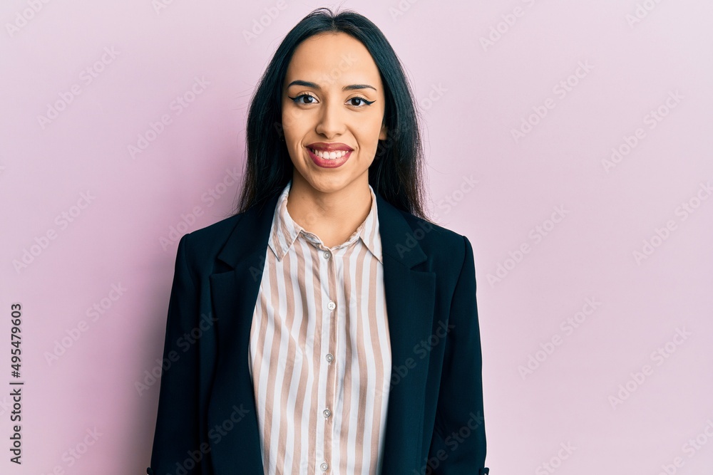 Young hispanic girl wearing business clothes with a happy and cool smile on face. lucky person. Young hispanic girl wearing business clothes with a happy and cool smile on face. lucky person.