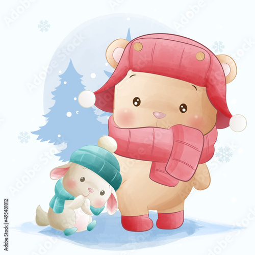 Cute animals, little bunny and teady bear playing in snow photo