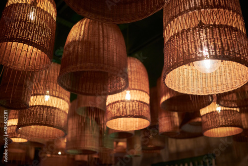 decorative lamps in the form of wicker baskets. lamp in the form of a wicker basket. cafe interior