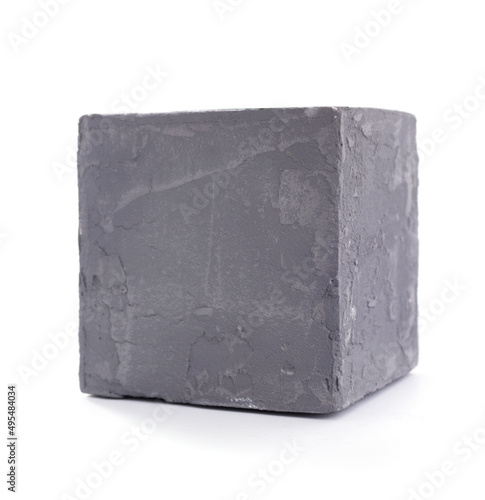 Concrete cube or cement block isolated at white background. Construction brick