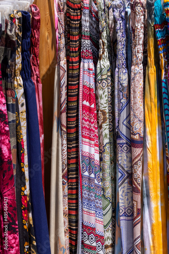 Natural, colorful clothes, oriental designs in shop in town on the Red Sea on the Sinai Peninsula, Dahab, Egypt © mychadre77