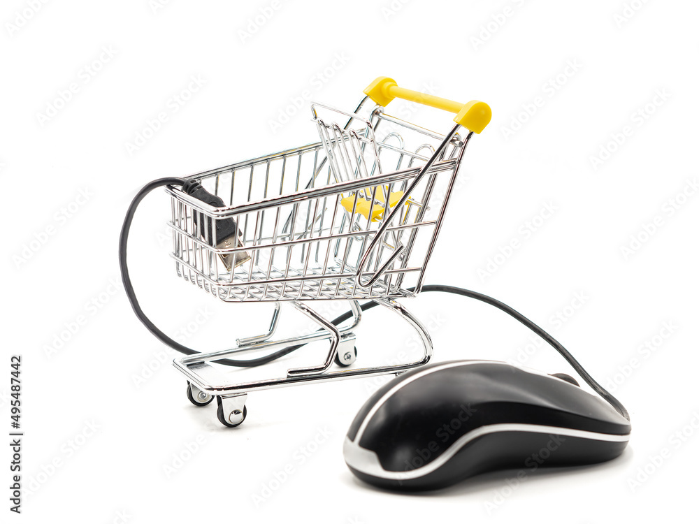Small shopping basket with mouse computer on a white background. Selective focus. Small shopping basket with mouse computer on a white background. Selective focus.