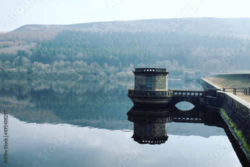 Water outlet tower on the Ladybower Reservoir dam, in the Dark Peak of the Peak District, Derbyshire, UK photo