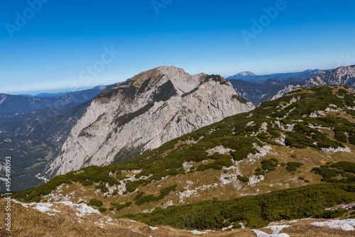 Panoramic view on the mountain peaks of the Hochschwab Region in Upper Styria, Austria.Summit of Riegerin in the beautiful Alps in Europe. Climbing tourism, wilderness. Concept freedom. Brunnsee photo