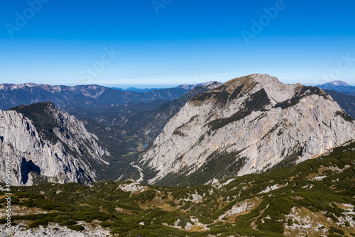 Panoramic view on the mountain peaks of the Hochschwab Region in Upper Styria, Austria.Summit of Riegerin in the beautiful Alps in Europe. Climbing tourism, wilderness. Concept freedom. Brunnsee