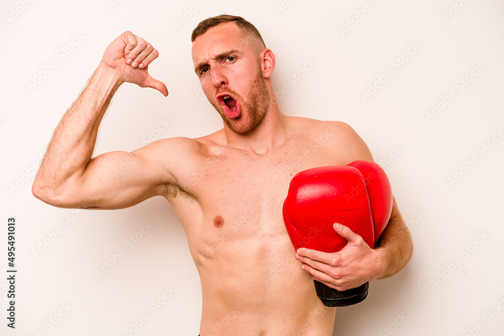 Young caucasian man doing boxing isolated on white background feels proud and self confident, example to follow. Young caucasian man doing boxing isolated on white background feels proud and self confident, example to follow.