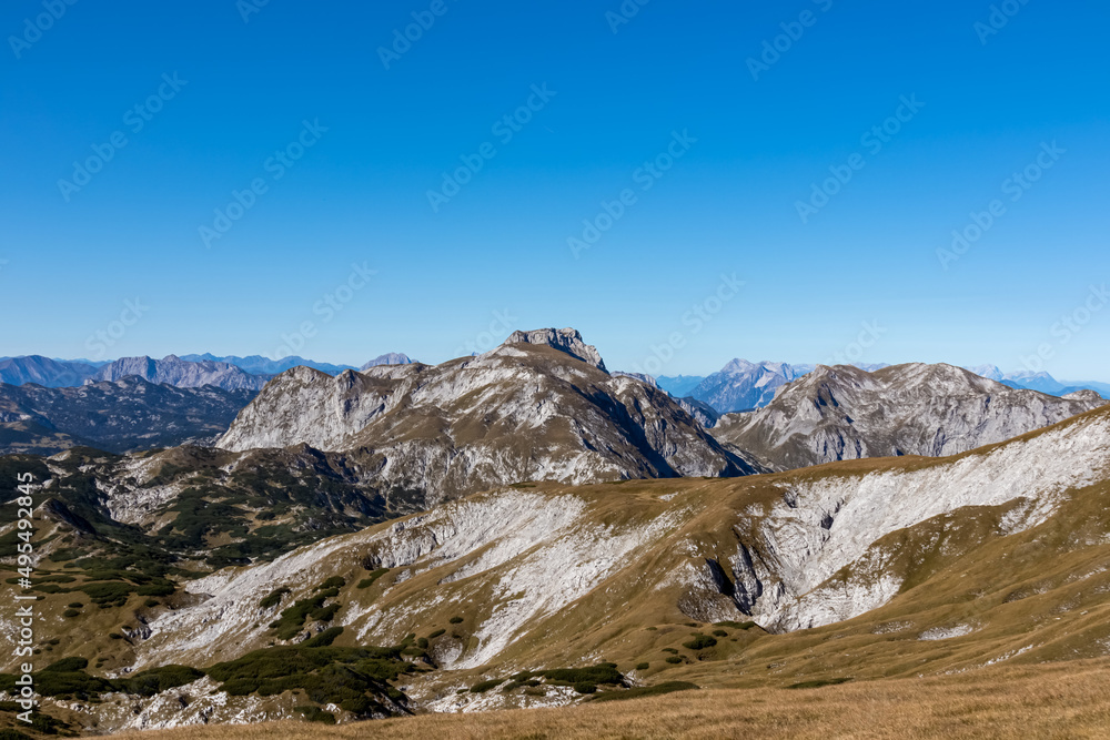 Panoramic view on the mountain peaks of the Hochschwab Region in Upper Styria, Austria. Sharp summits of Ebenstein and Hinterer Polster, Alps in Europe. Climbing, wilderness. Concept freedom