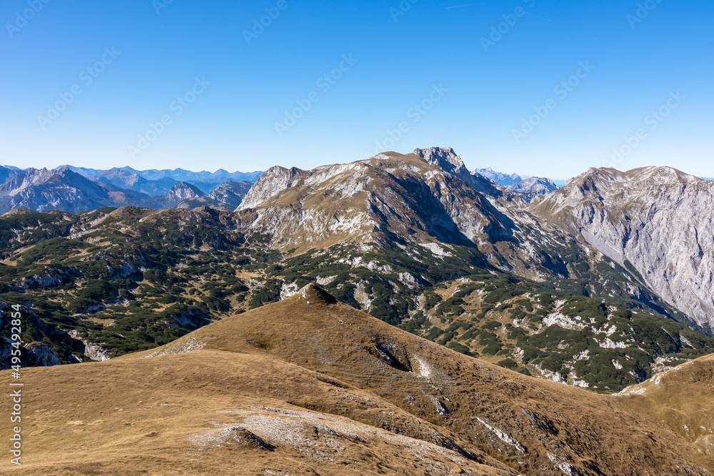 Panoramic view on the mountain peaks of the Hochschwab Region in Upper Styria, Austria. Sharp summits of Ebenstein and Hinterer Polster, Alps in Europe. Climbing tourism, wilderness. Concept freedom.