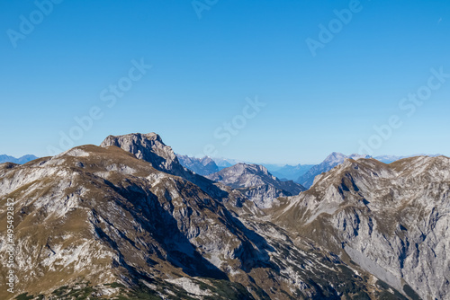 Panoramic view on the mountain peaks of the Hochschwab Region in Upper Styria, Austria. Sharp summits of Ebenstein and Hinterer Polster, Alps in Europe. Climbing tourism, wilderness. Concept freedom © Chris