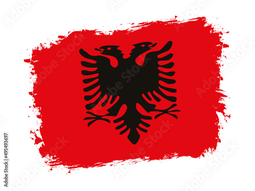flag of Albania on brush painted grunge banner - vector illustration