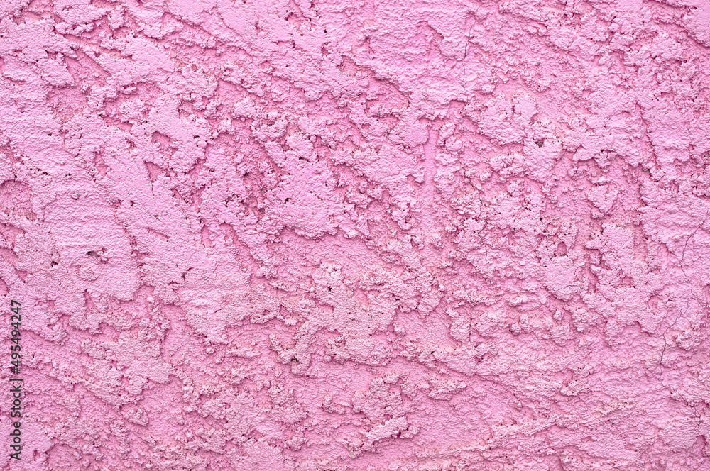 Fototapeta premium The surface of rough decorative sand-colored plaster