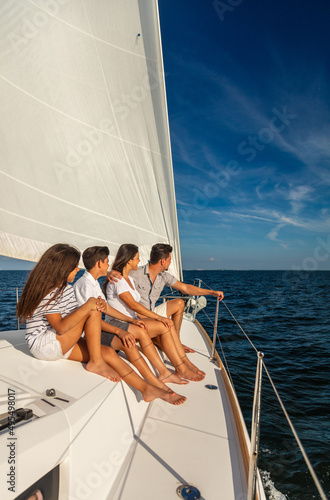 Latino family enjoying carefree lifestyle sailing the ocean © Spotmatik