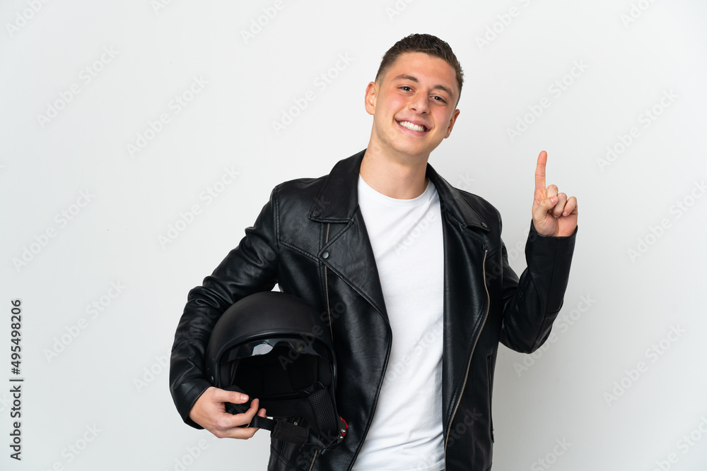 Caucasian man with a motorcycle helmet isolated on white background pointing up a great idea Caucasian man with a motorcycle helmet isolated on white background pointing up a great idea