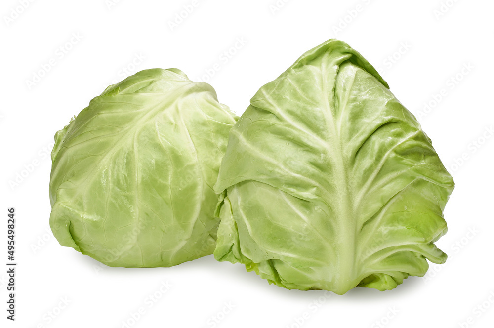 Fresh young cabbage on a wooden kitchen board for shredding on a blue background. Vegetables for cutting salad. Vegan food, diet, vitamins. Fresh young cabbage on a wooden kitchen board for shredding on a blue background. Vegetables for cutting salad. Vegan food, diet, vitamins.
