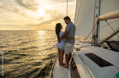 Romantic luxury vacation on private yacht at sunrise