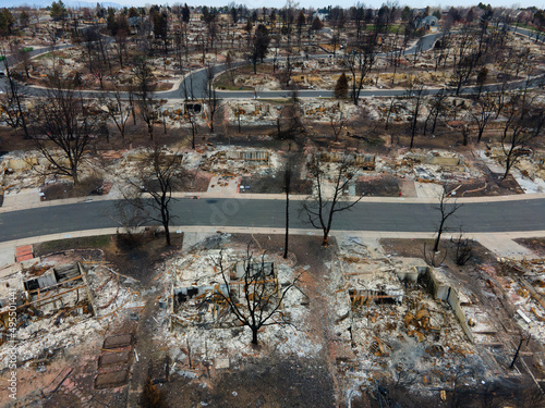 scorched homes from an urban wildfire that burnt through Louisville Colorado Marshall Fire