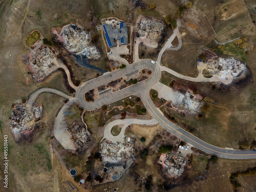remnants of burned homes from the destructive urban Marshall wildfire in Louisville Colorado due to Climate Change