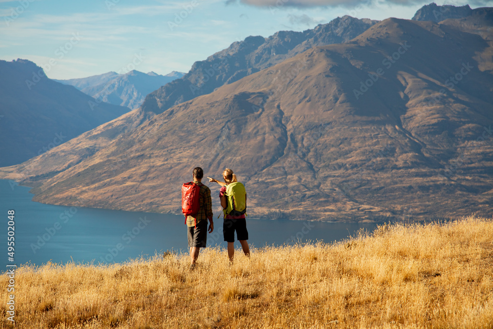 Male and female couple outdoor trekking The Remarkables