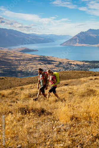 New Zealand Male female hikers trekking The Remarkables © Spotmatik