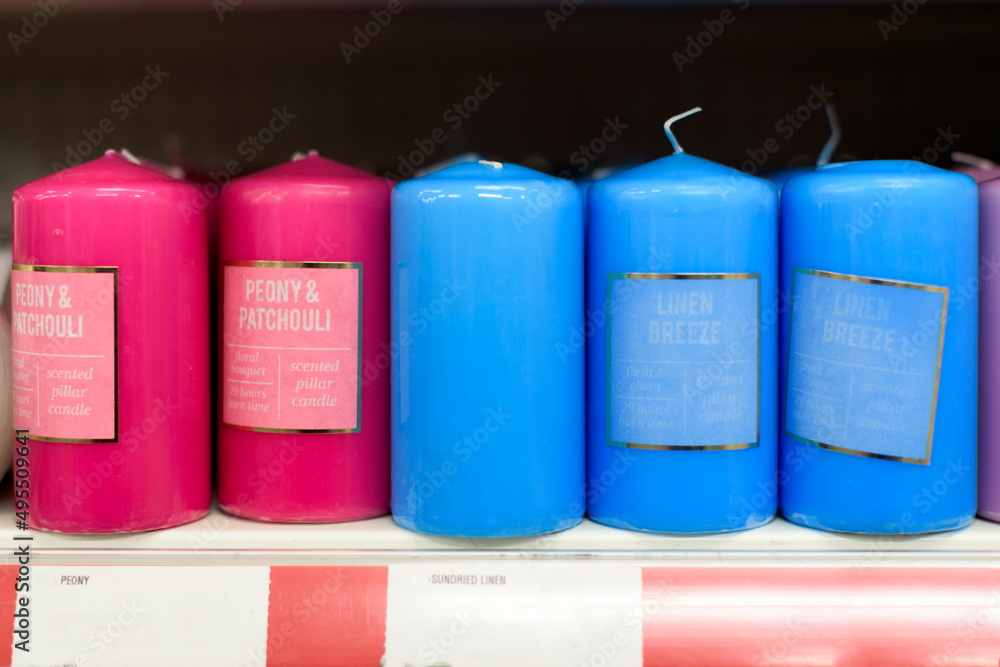 Pink and blue aromatherapy candles in a store. Pink and blue aromatherapy candles in a store.