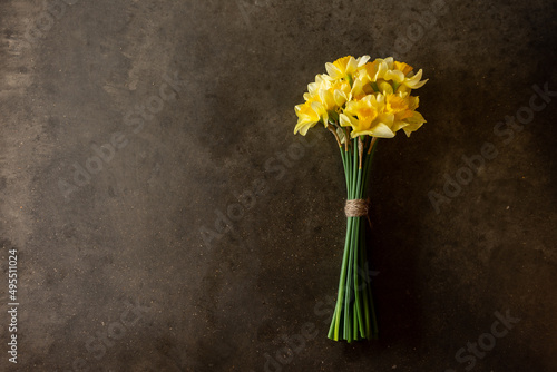 a boquet daffodil blooms on chalkboard